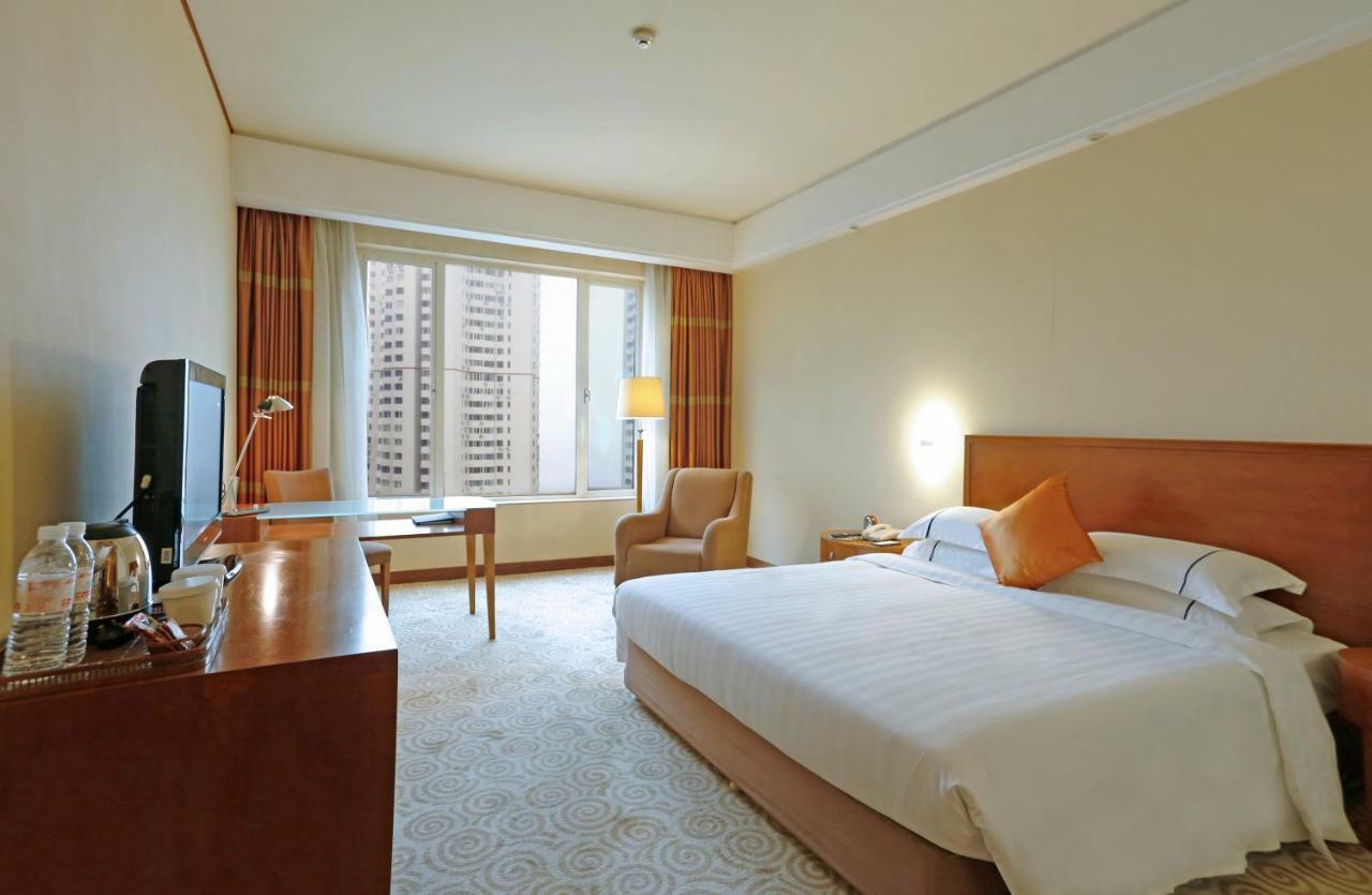 Hotel Equatorial Qingdao Quarto foto